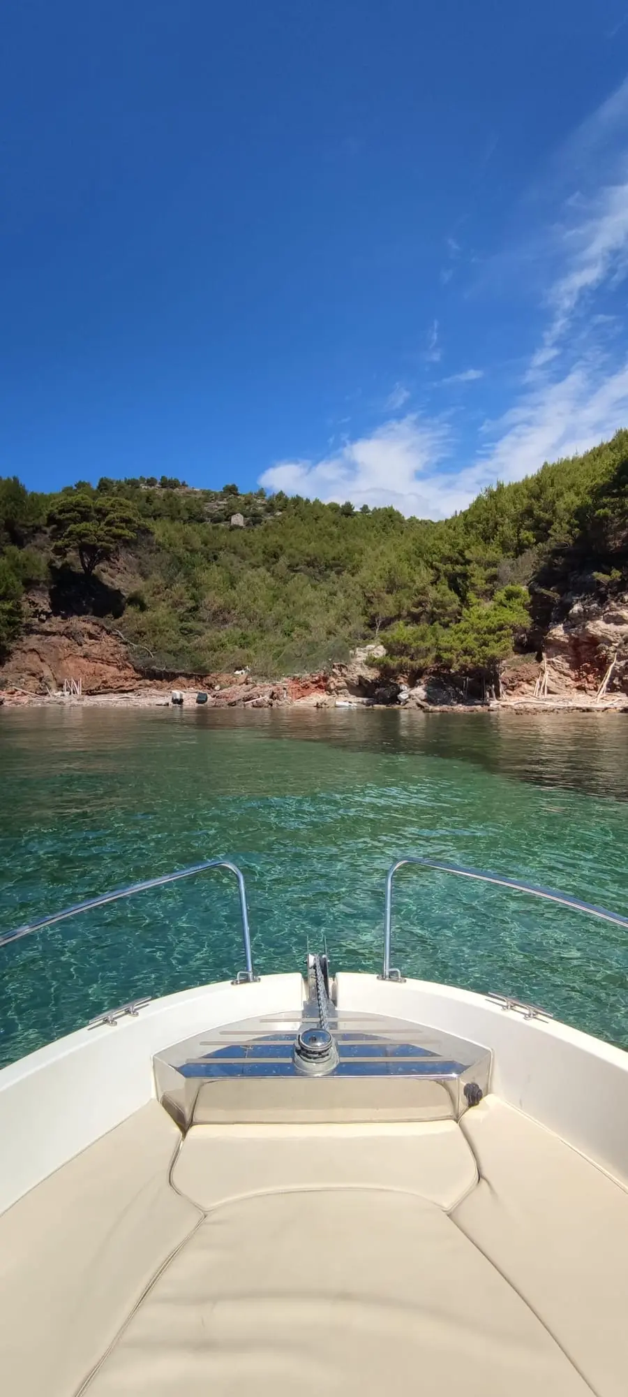 The boat anchored in a bay